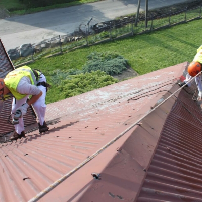 Reinigung und Anstrich von Blechdächern